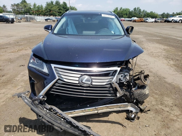 2017 Lexus RX 350 with VIN 2T2BZMCA3HC092809, listed as a Copart auction lot 61770475 with 106,732 mi miles and Salvage title. Bid and sale history available at DreamBid. Image 5.