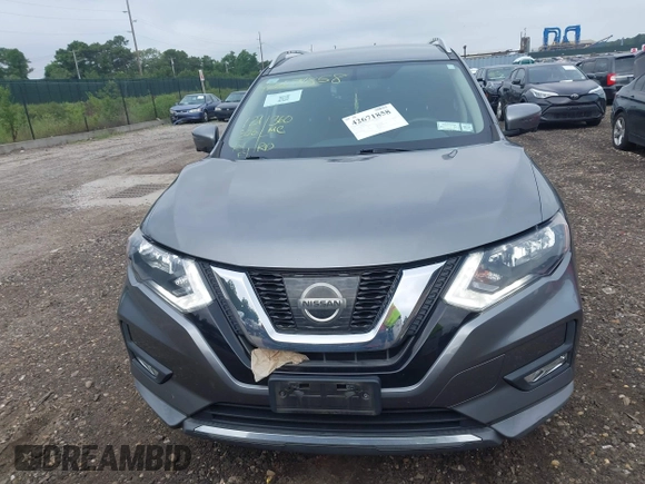 2017 Nissan Rogue S with VIN KNMAT2MV2HP581419, listed as a IAAI auction lot 42671858 with 121,308 mi miles and . Bid and sale history available at DreamBid. Image 12.