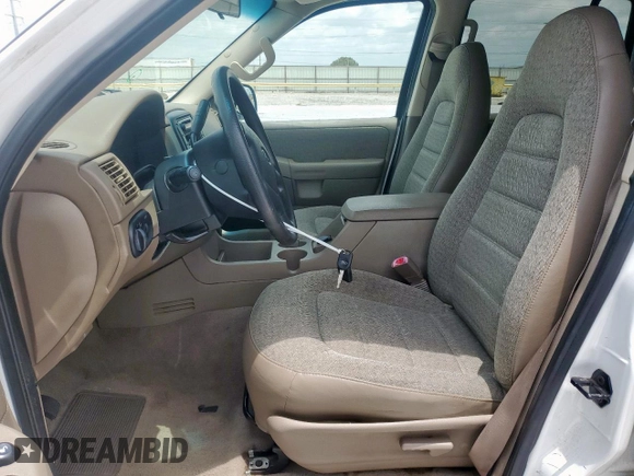 2002 Ford Explorer XLS with VIN 1FMZU62E62UA69368, listed as a Copart auction lot 61571065 with 124,095 mi miles and Salvage title. Bid and sale history available at DreamBid. Image 7.