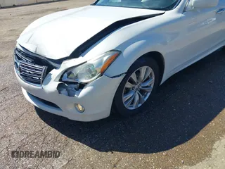 2011 Infiniti M with VIN JN1BY1AP8BM325061, listed as a IAAI auction lot 41765214 with 289,990 mi miles and . Bid and sale history available at DreamBid. Image 17.