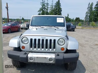 2012 Jeep Wrangler Unlimited Altitude with VIN 1C4HJWEG2CL140059, listed as a IAAI auction lot 42433563 with 189,868 mi miles and . Bid and sale history available at DreamBid. Image 12.