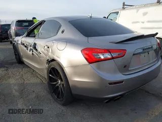 2015 Maserati Ghibli S Q4 z VIN ZAM57RTA8F1144095, wystawiony jako IAAI lot #41392848 z przebiegiem 52 237 mil mil oraz . Historia ofert i sprzedaży dostępna na DreamBid. Obrazek 3.