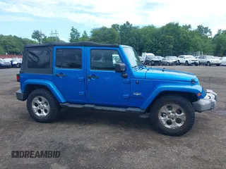 2015 Jeep Wrangler Unlimited Sahara with VIN 1C4BJWEG4FL677879, listed as a IAAI auction lot 42676097 with 85,821 mi miles and . Bid and sale history available at DreamBid. Image 13.