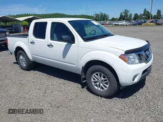 2019 Nissan Frontier Pro-4X z VIN 1N6AD0EV1KN730791, wystawiony jako IAAI lot #42338955 z przebiegiem 93 153 mil mil oraz . Historia ofert i sprzedaży dostępna na DreamBid. Obrazek 1.