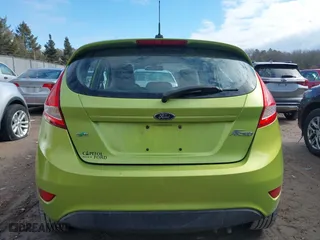 2011 Ford Fiesta SE with VIN 3FADP4EJ2BM113623, listed as a IAAI auction lot 41685229 with 137,954 mi miles. Bid and sale history available at carsss.com. Image 16.