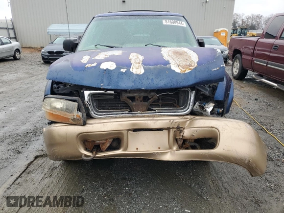 1999 GMC Jimmy SLE z VIN 1GKDT13W8X2545509, wystawiony jako Copart lot #81608944 z przebiegiem 130 881 mil mil oraz Szkoda całkowita • Salvage title. Historia ofert i sprzedaży dostępna na DreamBid. Obrazek 5.