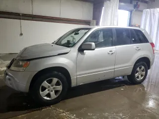 2011 Suzuki Grand Vitara Premium z VIN JS3TD0D22B4102488, wystawiony jako Copart lot #88127645 z przebiegiem 125 206 mil mil oraz Szkoda całkowita • Salvage title. Historia ofert i sprzedaży dostępna na DreamBid. Obrazek 1.