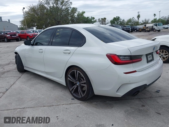2022 BMW 3 Series 330i with VIN 3MW5R1J06N8C46898, listed as a IAAI auction lot 41715618 with 44,533 mi miles. Bid and sale history available at carsss.com. Image 3.