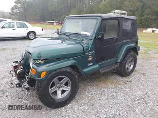 2000 Jeep Wrangler Sahara with VIN 1J4FA59SXYP701098, listed as a IAAI auction lot 41592872 with 1 mi miles. Bid and sale history available at carsss.com. Image 2.