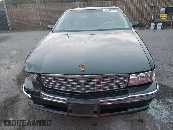 1995 Cadillac DeVille z VIN 1G6KD52B0SU252838, wystawiony jako Copart lot #87642595 z przebiegiem 72 847 mil mil oraz Szkoda całkowita • Salvage title. Historia ofert i sprzedaży dostępna na DreamBid. Obrazek 5.