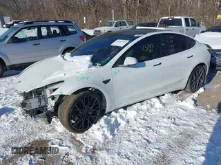 2021 Tesla Model 3 Performance with VIN 5YJ3E1EC1MF063445, listed as a IAAI auction lot 41293243 with 43,143 mi miles and . Bid and sale history available at DreamBid. Image 19.