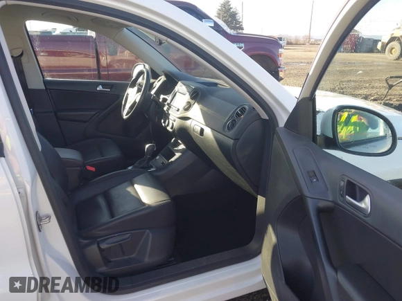 2017 Volkswagen Tiguan S with VIN WVGBV7AX2HK026612, listed as a IAAI auction lot 41320044 with 74,979 mi miles and . Bid and sale history available at DreamBid. Image 5.
