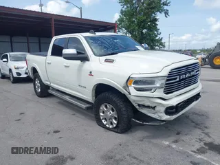 2020 Ram 2500 Laramie с VIN 3C6UR5FLXLG105044, выставлен на аукционе IAAI как лот 42376089 с пробегом 82 397 миль миль и . История ставок и продаж доступна на DreamBid. Изображение 1.