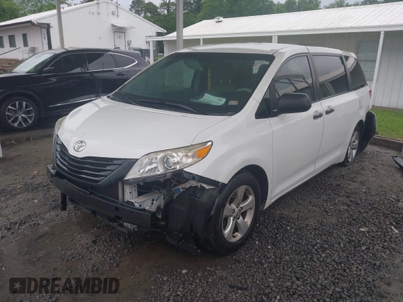2014 Toyota Sienna L with VIN 5TDZK3DC9ES473780, listed as a IAAI auction lot 42245274 with 203,060 mi miles and . Bid and sale history available at DreamBid. Image 18.