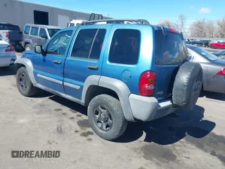 2005 Jeep Liberty Sport with VIN 1J4GK48K55W718275, listed as a IAAI auction lot 41869950 with 198,154 mi miles. Bid and sale history available at carsss.com. Image 3.