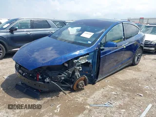 2018 Tesla Model X 75D with VIN 5YJXCAE21JF132628, listed as a IAAI auction lot 42081282 with 35,360 mi miles and . Bid and sale history available at carsss.com. Image 2.