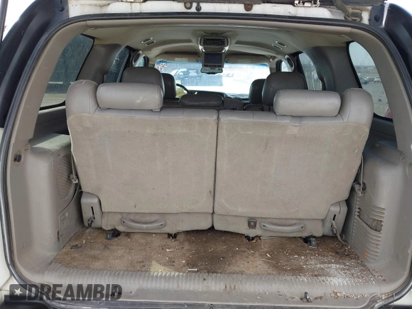 2003 GMC Yukon SLT with VIN 1GKEK13V23J300767, listed as a IAAI auction lot 41691632 with 251,849 mi miles. Bid and sale history available at carsss.com. Image 11.