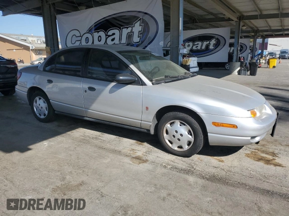 2002 Saturn SL with VIN 1G8ZH52882Z177307, listed as a Copart auction lot 59407345 with 63,864 mi miles and Clean title. Bid and sale history available at DreamBid. Image 4.
