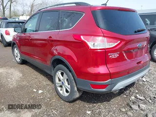 2014 Ford Escape SE with VIN 1FMCU0GX8EUA49818, listed as a IAAI auction lot 41903815 with 100,235 mi miles. Bid and sale history available at carsss.com. Image 3.