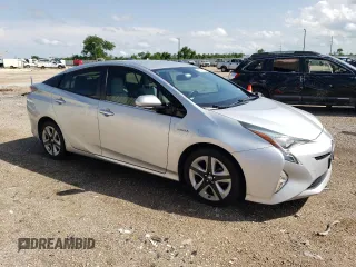2016 Toyota Prius Four z VIN JTDKARFU0G3500883, wystawiony jako Copart lot #55211615 z przebiegiem 117 528 mil mil oraz Czysty tytuł • Clean title. Historia ofert i sprzedaży dostępna na DreamBid. Obrazek 4.