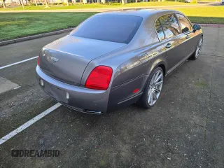 2006 Bentley Flying Spur with VIN SCBBR53W66C034319, listed as a Copart auction lot 65658225 with 85,166 mi miles and Salvage title. Bid and sale history available at DreamBid. Image 4.