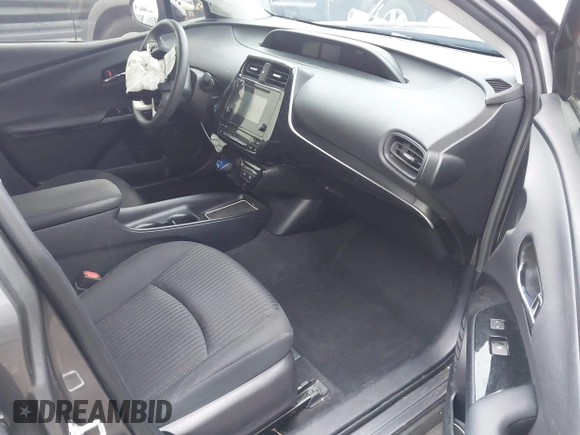 2018 Toyota Prius Two with VIN JTDKBRFUXJ3591956, listed as a IAAI auction lot 41848336 with 62,560 mi miles and . Bid and sale history available at DreamBid. Image 5.