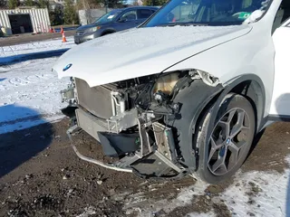 2018 BMW X1 xDrive28i with VIN WBXHT3C36J5L30217, listed as a IAAI auction lot 41237775 with 60,071 mi miles. Bid and sale history available at carsss.com. Image 18.