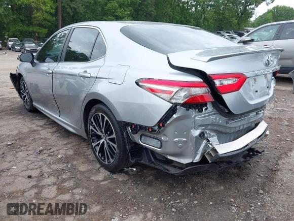 2018 Toyota Camry LE z VIN 4T1B11HK3JU129549, wystawiony jako IAAI lot #42159243 z przebiegiem 76 299 mil mil oraz . Historia ofert i sprzedaży dostępna na DreamBid. Obrazek 3.