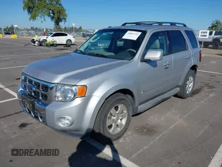 2009 Ford Escape Hybrid with VIN 1FMCU59349KA94375, listed as a IAAI auction lot 41865743 with 127,538 mi miles and . Bid and sale history available at DreamBid. Image 2.