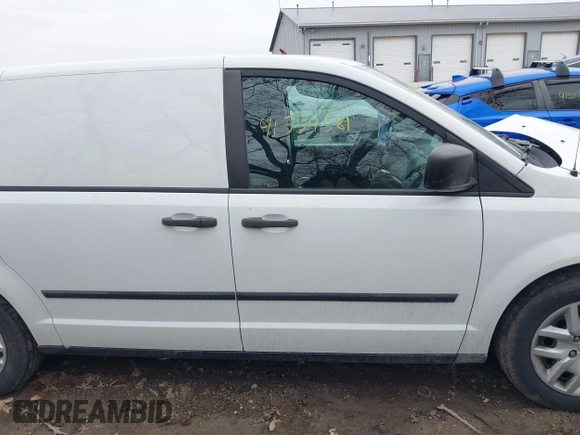 2014 Ram Cargo Van Tradesman with VIN 2C4JRGAG3ER379961, listed as a IAAI auction lot 41554581 with 186,198 mi miles. Bid and sale history available at carsss.com. Image 14.