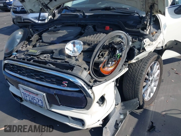 2015 MINI Hardtop S z VIN WMWXP7C55F2A39819, wystawiony jako IAAI lot #42338717 z przebiegiem 64 961 mil mil oraz . Historia ofert i sprzedaży dostępna na DreamBid. Obrazek 17.