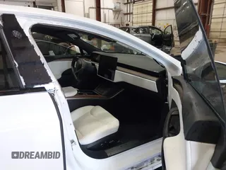 2022 Tesla Model S with VIN 5YJSA1E59NF469984, listed as a IAAI auction lot 42426490 with Not provided miles and . Bid and sale history available at DreamBid. Image 5.