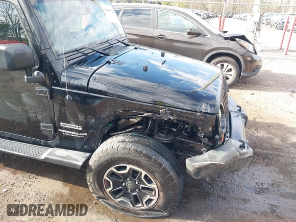2013 Jeep Wrangler Unlimited Freedom z VIN 1C4BJWDG8DL648870, wystawiony jako IAAI lot #41909372 z przebiegiem 184 203 mil mil oraz . Historia ofert i sprzedaży dostępna na DreamBid. Obrazek 6.