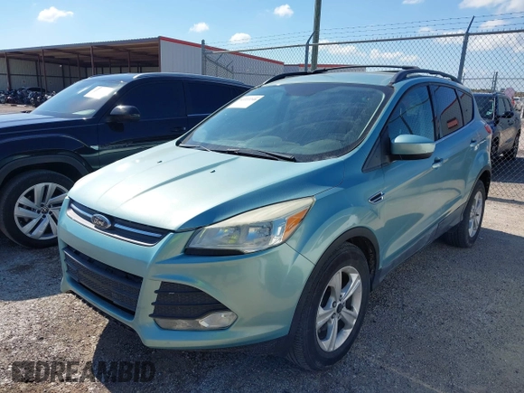 2013 Ford Escape SE with VIN 1FMCU0GX6DUA85991, listed as a IAAI auction lot 42222248 with 136,457 mi miles and . Bid and sale history available at DreamBid. Image 2.