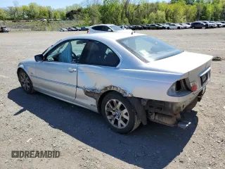 2000 BMW 3 Series 323Ci with VIN WBABM3345YJN83679, listed as a Copart auction lot 54029145 with 165,327 mi miles and Salvage Title. Bid and sale history available at DreamBid. Image 2.