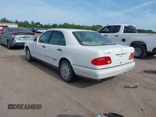 1998 Mercedes-Benz E-Class with VIN WDBJF65FXWA615255, listed as a IAAI auction lot 42146962 with 219,710 mi miles. Bid and sale history available at carsss.com. Image 3.
