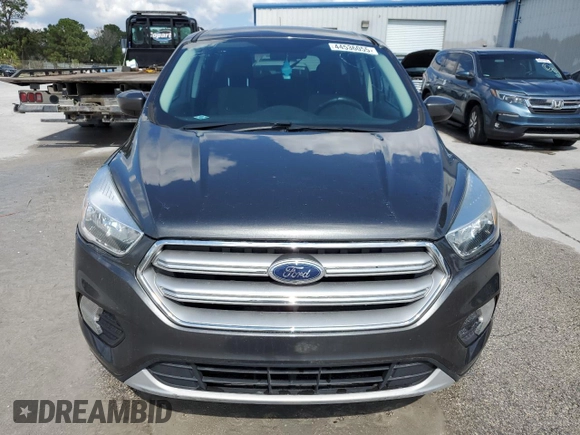 2017 Ford Escape SE z VIN 1FMCU0GDXHUE91333, wystawiony jako Copart lot #44536055 z przebiegiem Nie podano mil oraz Nie do naprawy • Non repairable. Historia ofert i sprzedaży dostępna na DreamBid. Obrazek 5.