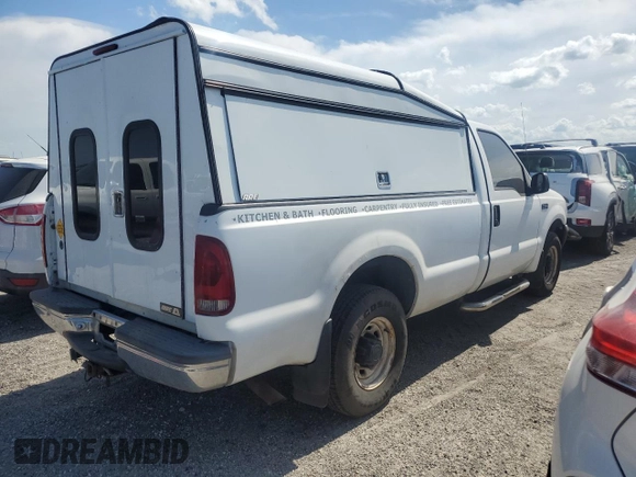 2003 Ford F-250 XL with VIN 1FTNF20L13ED53722, listed as a Copart auction lot 76193674 with Not provided miles and Salvage title. Bid and sale history available at DreamBid. Image 3.