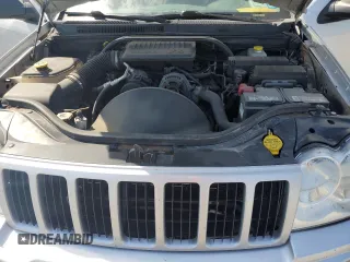 2005 Jeep Grand Cherokee Laredo with VIN 1J4GR48KX5C565762, listed as a Copart auction lot 63080115 with 122,349 mi miles and Salvage title. Bid and sale history available at DreamBid. Image 12.