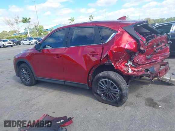 2020 Mazda CX-5 Sport with VIN JM3KFABM7L1819493, listed as a IAAI auction lot 41304240 with 52,940 mi miles. Bid and sale history available at carsss.com. Image 14.