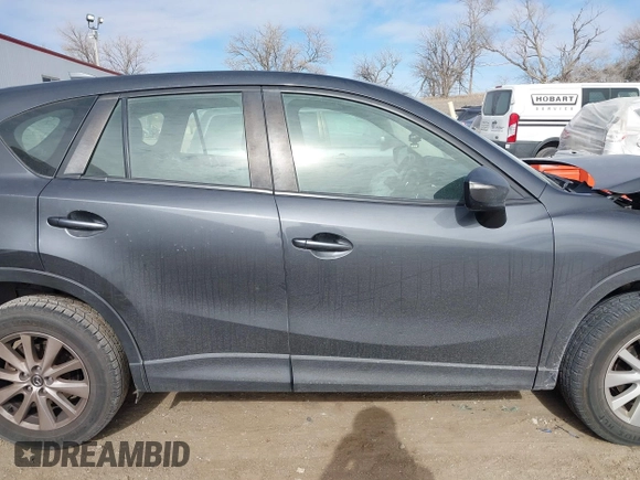 2016 Mazda CX-5 Sport with VIN JM3KE4BY0G0623365, listed as a IAAI auction lot 41525002 with 127,674 mi miles and . Bid and sale history available at carsss.com. Image 13.