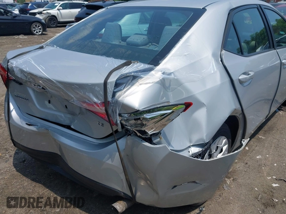2018 Toyota Corolla L with VIN 2T1BURHE8JC116054, listed as a IAAI auction lot 42450016 with 65,342 mi miles and . Bid and sale history available at DreamBid. Image 6.