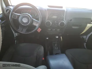2017 Jeep Wrangler Unlimited Sport with VIN 1C4BJWDG5HL714927, listed as a Copart auction lot 48540615 with 103,627 mi miles and Clean Title. Bid and sale history available at carsss.com. Image 8.