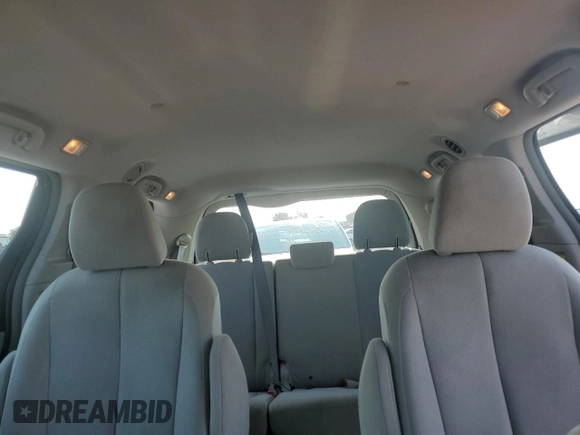 2013 Toyota Sienna L z VIN 5TDZK3DC7DS289663, wystawiony jako Copart lot #59146295 z przebiegiem 124 876 mil mil oraz Szkoda całkowita • Salvage title. Historia ofert i sprzedaży dostępna na DreamBid. Obrazek 10.