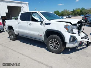 2021 GMC Sierra 1500 AT4 with VIN 1GTU9EET1MZ164656, listed as a IAAI auction lot 41894864 with 69,204 mi miles. Bid and sale history available at carsss.com. Image 1.
