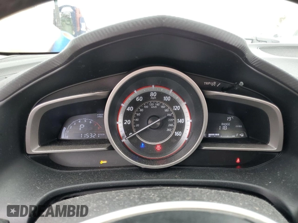 2016 Mazda 3 i Touring z VIN JM1BM1V7XG1311352, wystawiony jako Copart lot #56194805 z przebiegiem 115 321 mil mil oraz Szkoda całkowita • Salvage title. Historia ofert i sprzedaży dostępna na DreamBid. Obrazek 9.