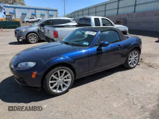 2007 Mazda MX-5 Miata Sport z VIN JM1NC25F070134457, wystawiony jako Copart lot #57051235 z przebiegiem 41 056 mil mil oraz Szkoda całkowita • Salvage title. Historia ofert i sprzedaży dostępna na DreamBid. Obrazek 1.