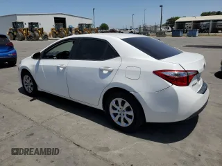2014 Toyota Corolla L with VIN 5YFBURHE8EP069548, listed as a Copart auction lot 61000225 with 119,711 mi miles and Salvage title. Bid and sale history available at DreamBid. Image 2.
