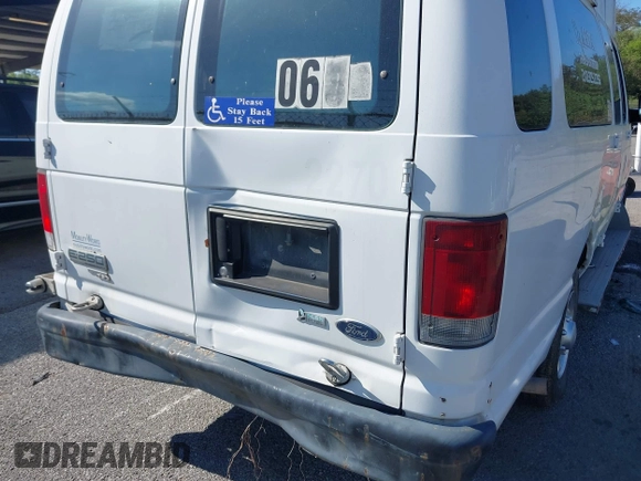 2012 Ford Econoline Cargo Commercial with VIN 1FTNS2EW4CDA50633, listed as a IAAI auction lot 40694015 with 309,334 mi miles. Bid and sale history available at carsss.com. Image 17.