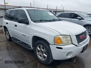 2003 GMC Envoy SLT with VIN 1GKDS13S232356221, listed as a IAAI auction lot 41500342 with 86,080 mi miles. Bid and sale history available at carsss.com. Image 1.